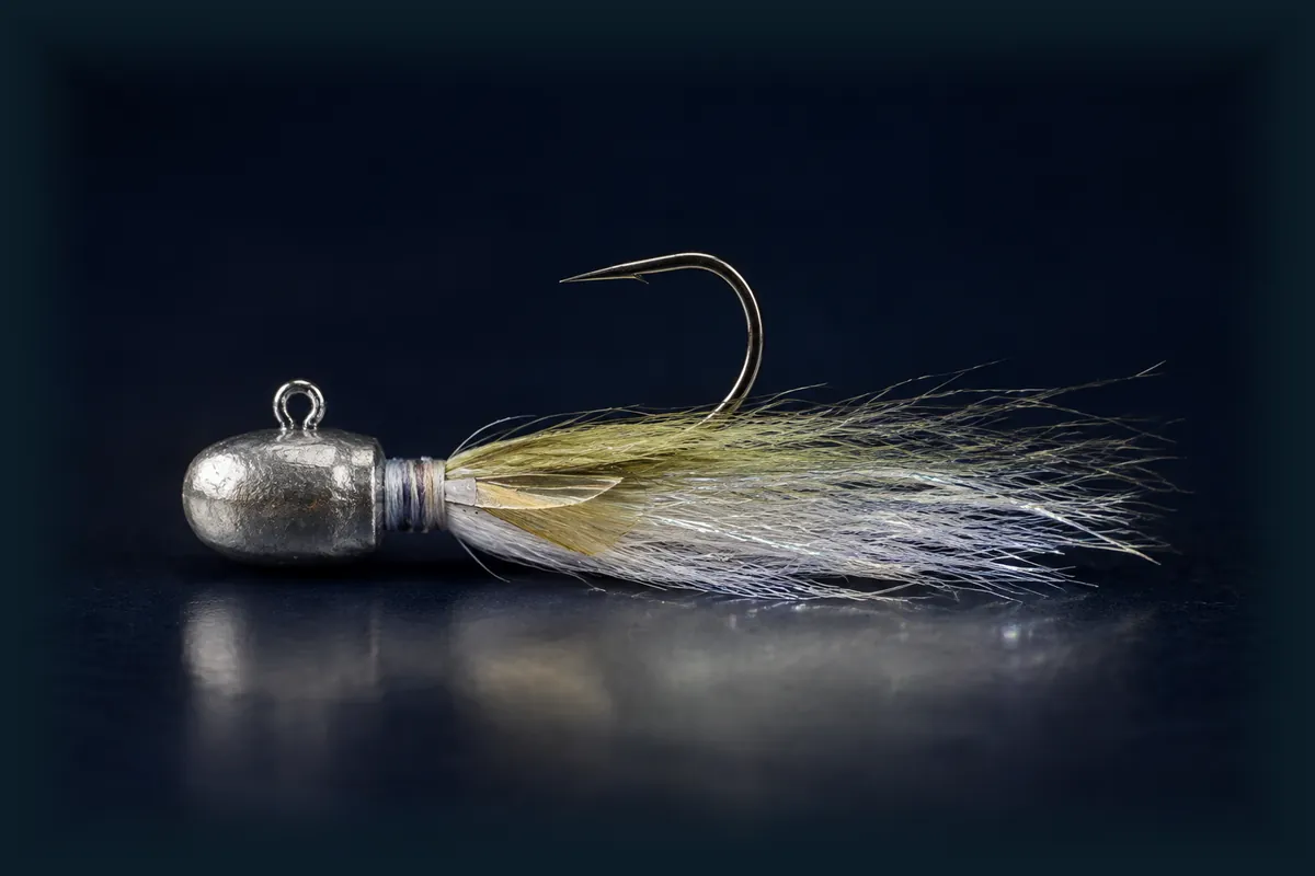 Unbranded Walleye jig on a dark blue background